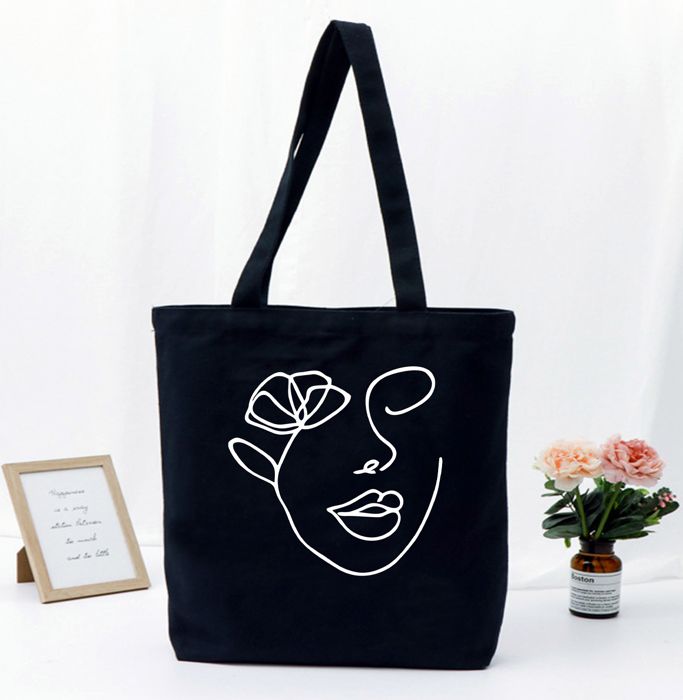 Tote Bag Noir Tissu Canvas avec motif Line Art Female Woman Flower Eyes