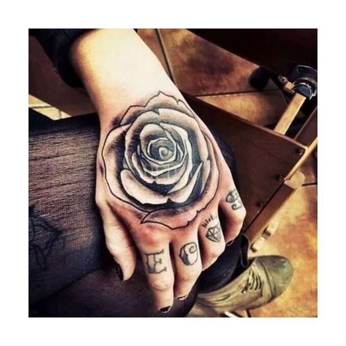 Faux tatouages autocollants temporaires à la main fleur et symbole imperméables