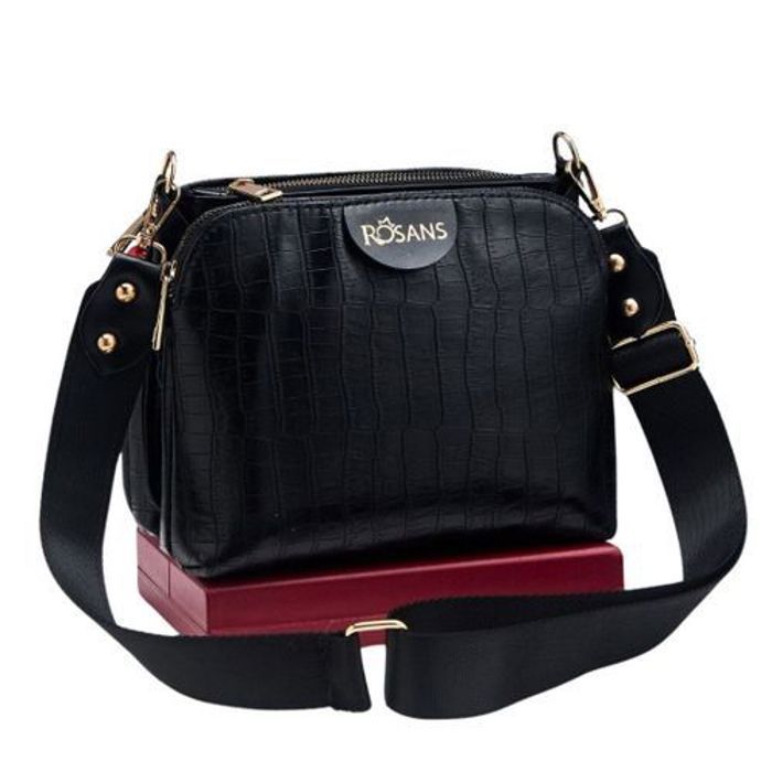 Sac à main d'affaires en cuir : style classique et pratique en bandoulière.