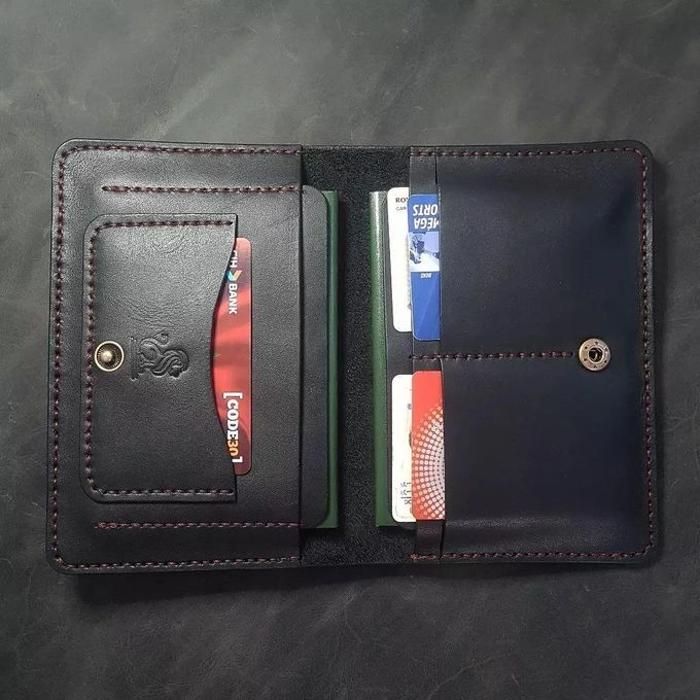 The " Traveling Lion " is a Passport wallet / cover