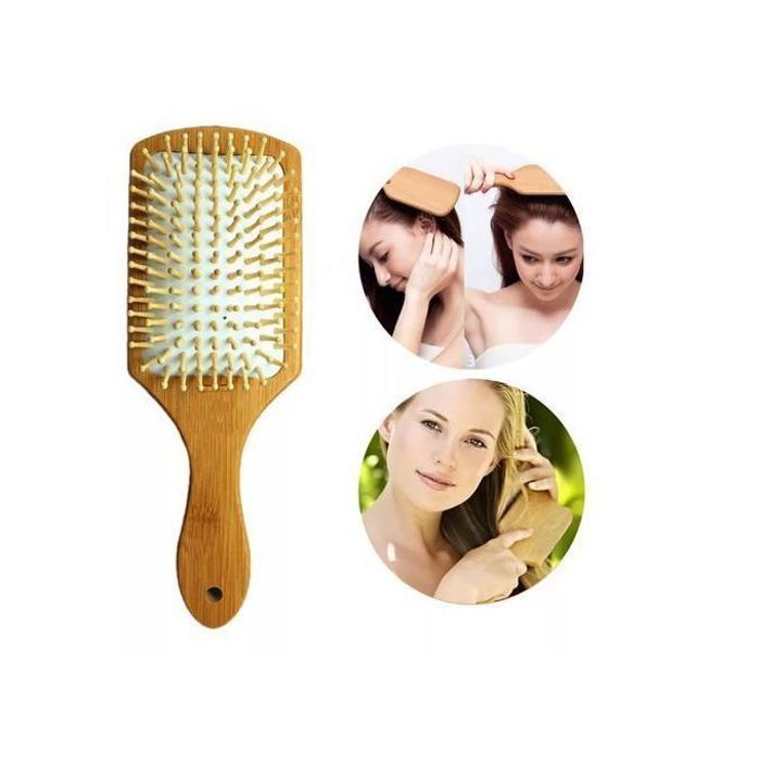 Le peigne antistatique de brosse de soin de cheveux de massage en bois de spa favorise la circulation sanguine