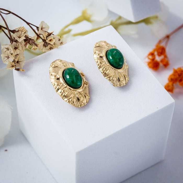BOUCLES EN ACIER ORNEES DES PIERRES EN COULEUR