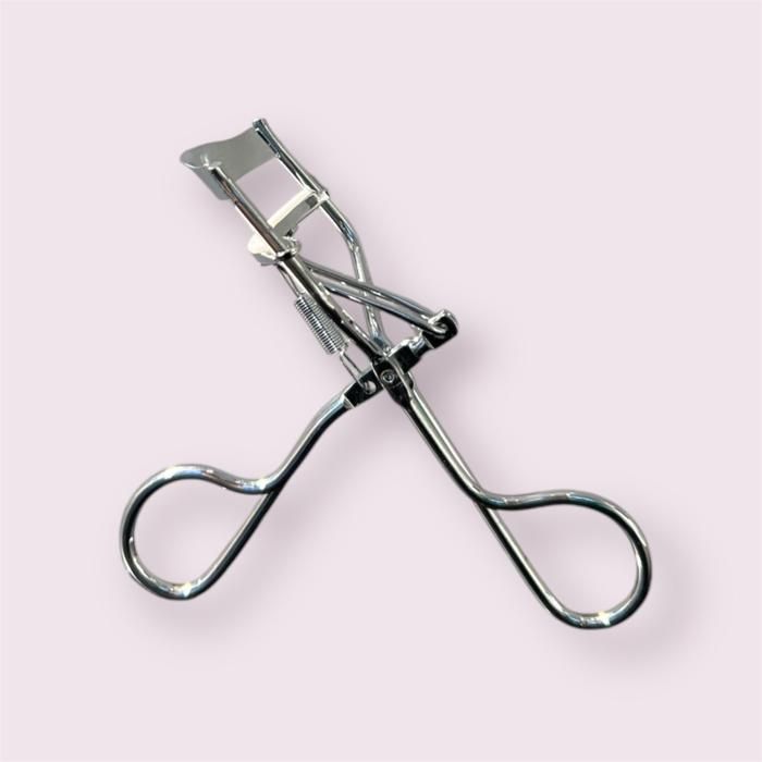 Curly white eyelash curler