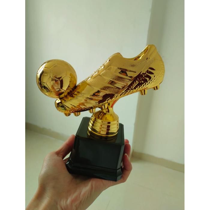 Trophée de football, chaussures dorées